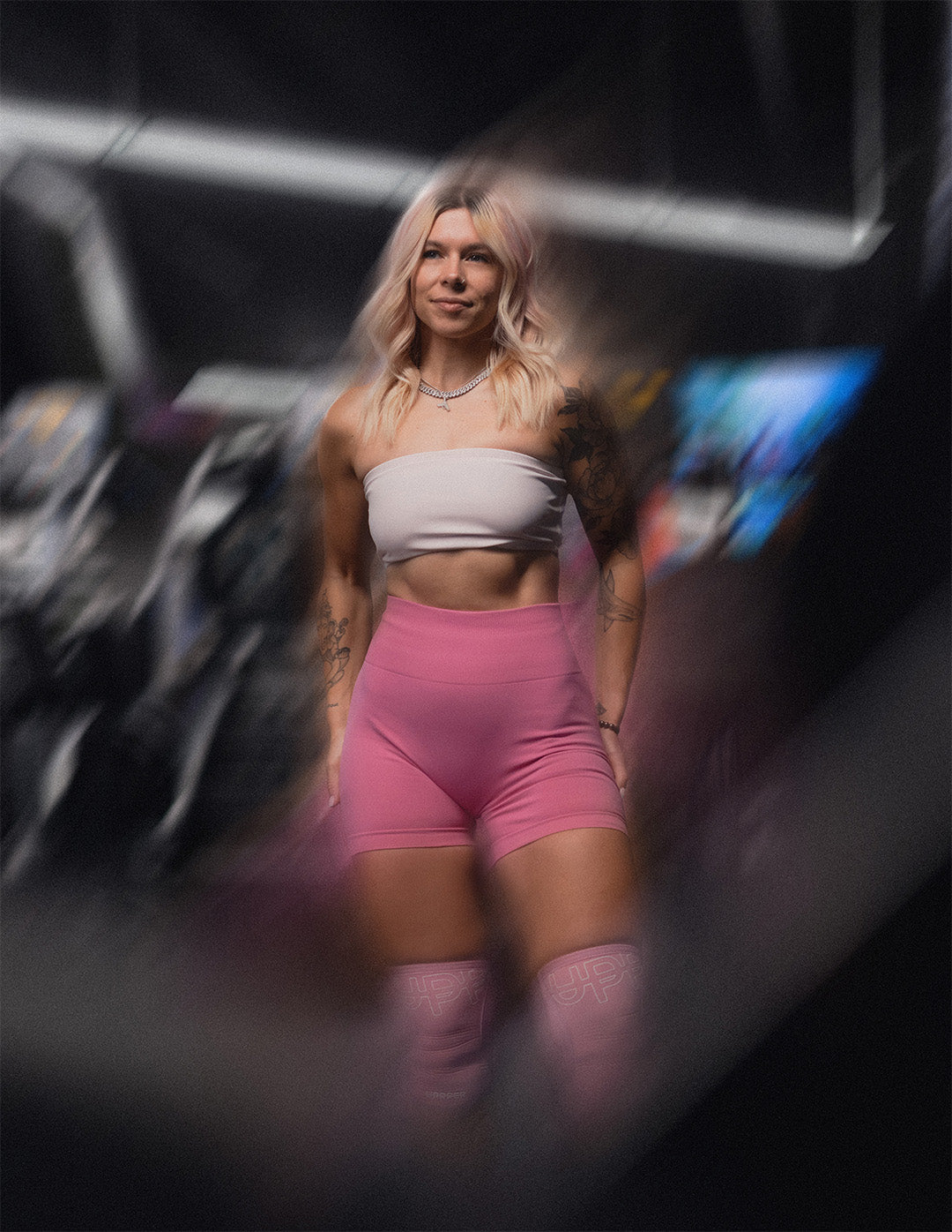 woman posing wearing uppper fitness gear