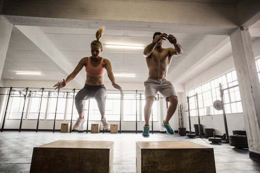 woman and man doing circuit training workout