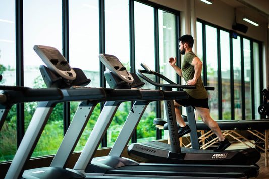 man running on treadmill